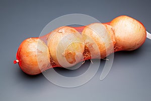 Onions in a mesh bag