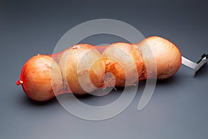 Onions in a mesh bag