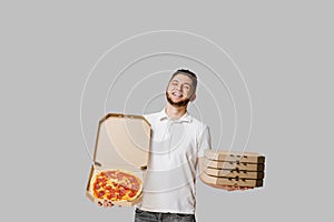 Online 4 pizza boxes safety delivery servise from restaurant. promotion pizza with cheese boards.