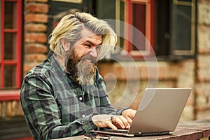 Online business. Online entrepreneur working outdoors. Man busy work with laptop. Businessman laptop terrace. Online