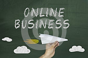 Online business words on blackboard