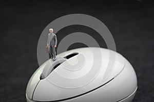 Online business, www or social media marketing with click through rate concept, miniature figure businessman standing on white