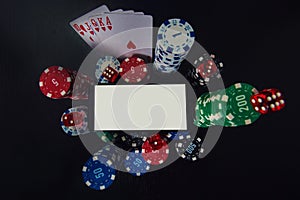Online casino gambling concept. Smartphone blank screen on chips stack, royal flush poker cards combination and red dices over