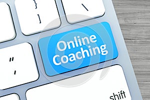 Online Coaching Text on a Button on Modern Computer Keyboard. To