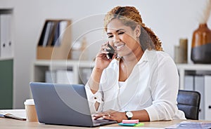 Online communication, businesswoman on smartphone and laptop at her workstation in office. Networking or connectivity