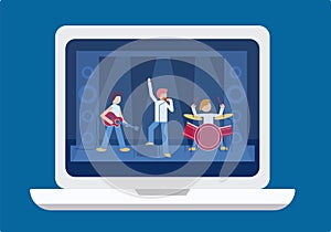 Online concert music festival on laptop screen. Male rock band playing drums, electric guitar. Famous singer sings into