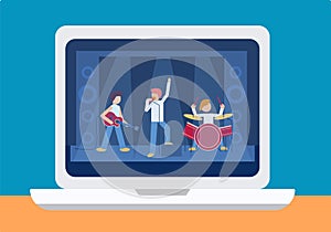 Online concert music festival on laptop screen. Male rock band playing drums, electric guitar. Famous singer sings into microphone