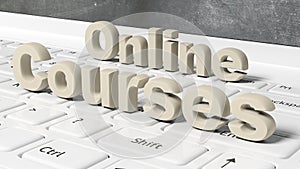 Online Courses 3D text on laptop keyboard photo