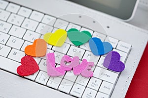 Online Dating, Computer keyboard with Symbol Heart in LGBT pride colors