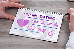 Online dating concept on a notepad
