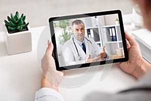 Online Doctor. Lady Talking To Therapist Via Video Call On Digital Tablet