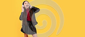 online education. back to school. happy teen girl in headphones full length. music lover. Child portrait with headphones