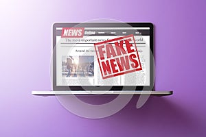 Online fake news on a laptop screen