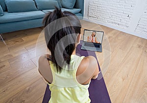 Online fitness. People on laptop in online fitness training working out with virtual personal coach