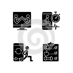 Online fitness wellness programs black glyph icons set on white space.