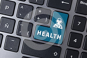 Online healthcare service concept with computer keyboard design and text