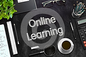 Online Learning Concept on Black Chalkboard. 3D Rendering.