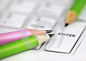 Online learning, education, e-learning concept, pencils on a keyboard
