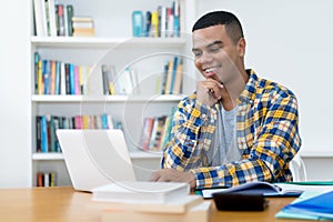 Online lecture of hispanic computer science student with braces