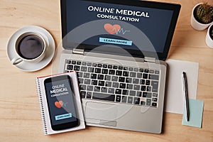 Online medical consultation concept on laptop and smartphone screen