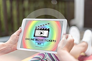 Online movie tickets buying concept on a tablet