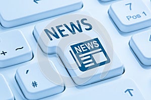 Online newspaper news blue computer keyboard
