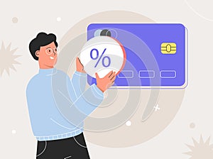 Online payment cashback concept. Man holding shape with percent debit or credit card and paying shopping online. Virtual