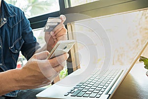 Online payment,Man's hands holding smart phone