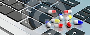 Online pharmacy. Pills capsules on computer keyboard. 3d illustration