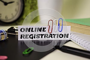 Online Registration on the paper isolated on it desk. Business and inspiration concept