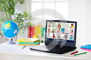 Online remote learning. School kids computer