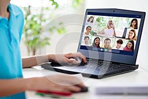 Online remote learning. School kids with computer photo