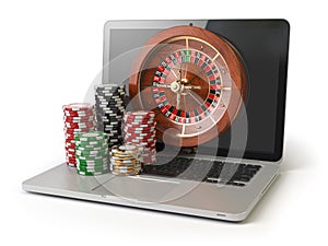 Online roulette casino concept. Laptop with roulette and casino