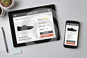 Online shop concept on tablet and smartphone screen