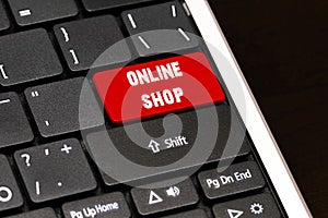 Online shop on Red Enter Button on black keyboard