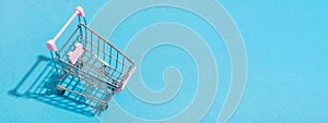 Online shopping cart Blue sky background