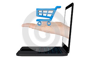 Online shopping concept. Shopping Cart Icon in hand with Laptop