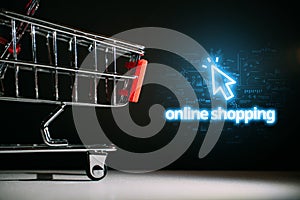 Online shopping concept with shopping cart and neon sign