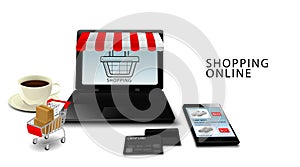 Online shopping concept, Smartphone and laptop with credit cards, Products on Cart with isolated white background