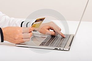 Online Shopping Concept. Women use credit card to payment shopping from laptop