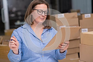 online shopping: dropshipping business woman, shipping boxes, and a retail online orders tracking