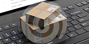 Online shopping, e-commerce and package delivery concept, Parcels on laptop keyboard. 3d illustration