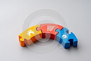 Online shopping icon on colorful jigsaw puzzle for global concept