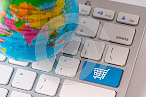 Online shopping icon with globe for global concept