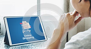 Online shopping and online retailer business. a man using digital tablet for shopping and selling online