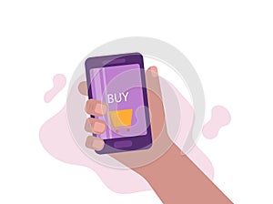 Online shopping. Payment by phone. A man's hand holds a phone with the inscription buy.