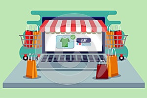 online shopping technology in laptop with shopping bags and carts