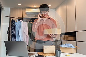 Online small business entrepreneur merchants working at store preparing products to deliver to customers, startup and online