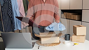 Online small business entrepreneur merchants working at store preparing products to deliver to customers, startup and online