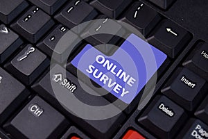 Online Survey isolated on laptop keyboard background